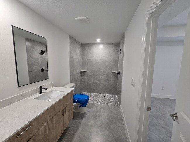 Building Photo - Brand-New 4-Bed Beauty with Attached Garage in Palm Bay – Modern Comfort, Prime Convenience!