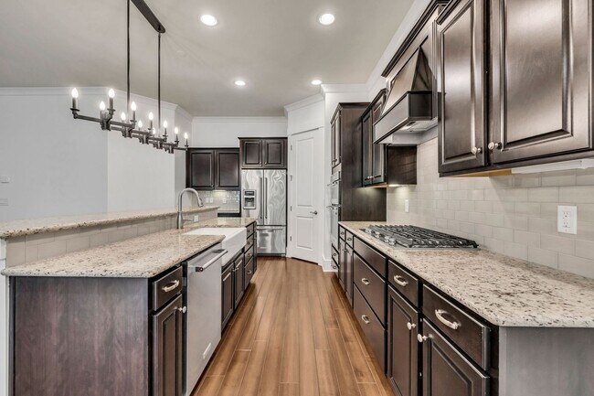 Building Photo - Beautifully maintained and move-in ready, this stunning mostly one-level all-brick home