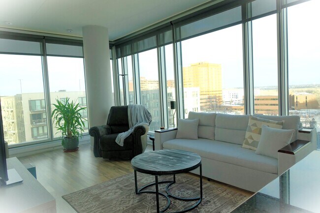 Ceiling-to-floor windows frame the stunning views - 8161 33rd Ave S