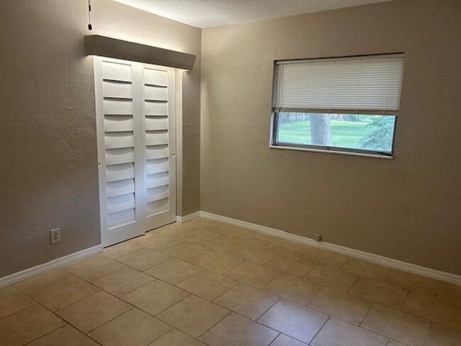 Building Photo - Beautifully landscaped 2/1/1 Jungle Prada ...