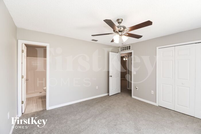 Building Photo - 6565 Gentle Oaks Dr
