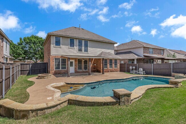 Building Photo - "Luxurious 4-Bedroom, 2.5 Bath Retreat wit...