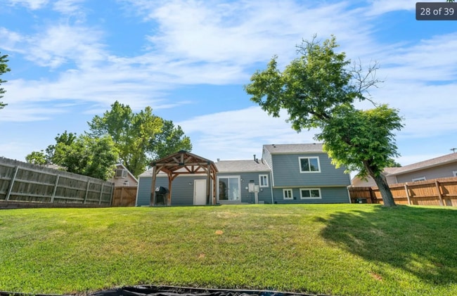 Building Photo - 6604 S Dahlia Cir