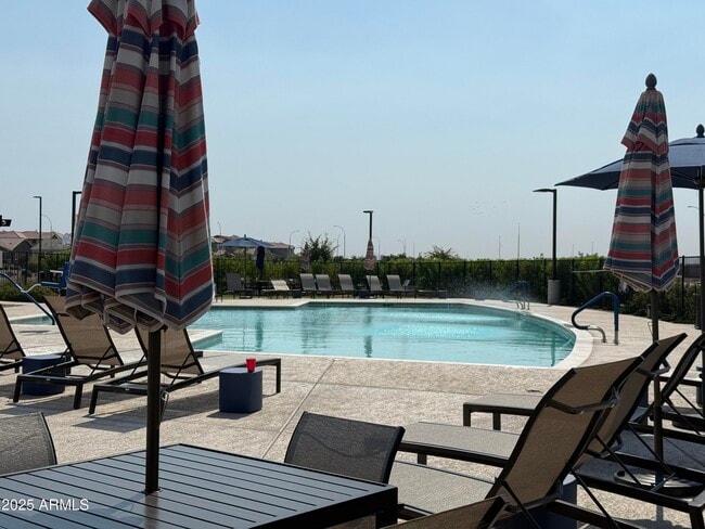 Building Photo - 9960 W Mitchell Ave