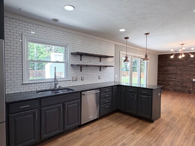 Building Photo - Updated 3BR Home in Beaver Lake | Fenced Yard, Garage, Covered Porch & Outdoor Fireplace | Pet Fr...