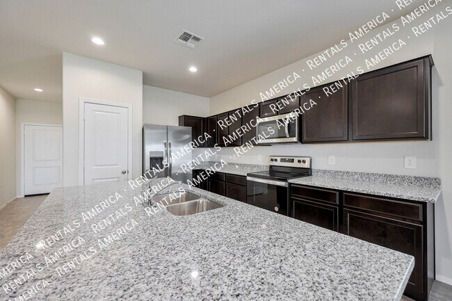 Building Photo - 18436 W Artemisa Ave