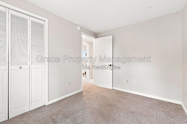 Building Photo - 8917 E Chenango Ave