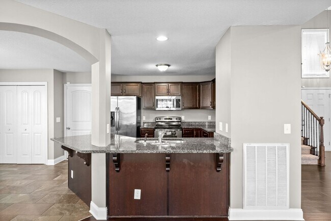 Building Photo - Three Bedroom with Bonus in Franklin Meadows!