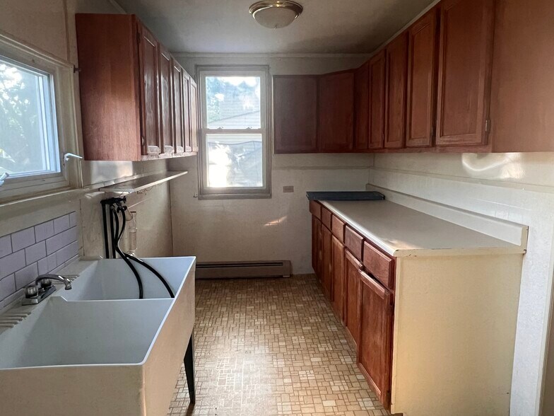 Lots of storage in the laundry room - 1726 Temple Ave