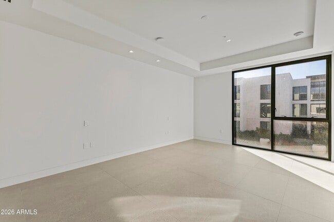 Building Photo - 6587 N Palmeraie Blvd