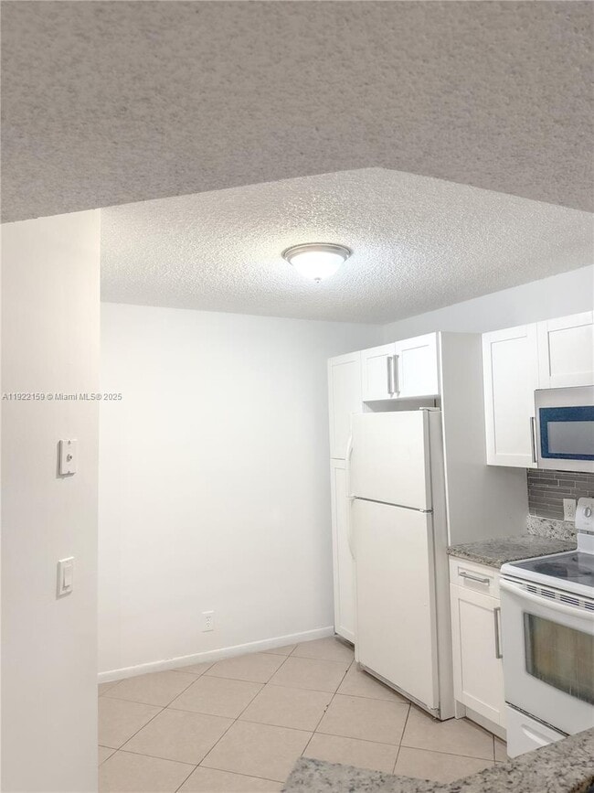 Building Photo - 8851 Wiles Rd