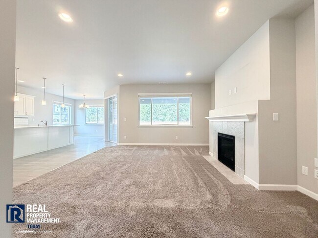 Building Photo - Easy JBLM Commute Like-New 4BR Home with 3-Car Garage & Bonus Office