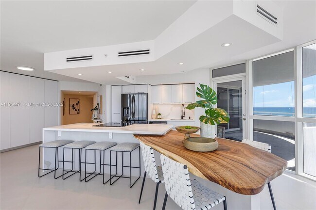 Building Photo - 6301 Collins Ave