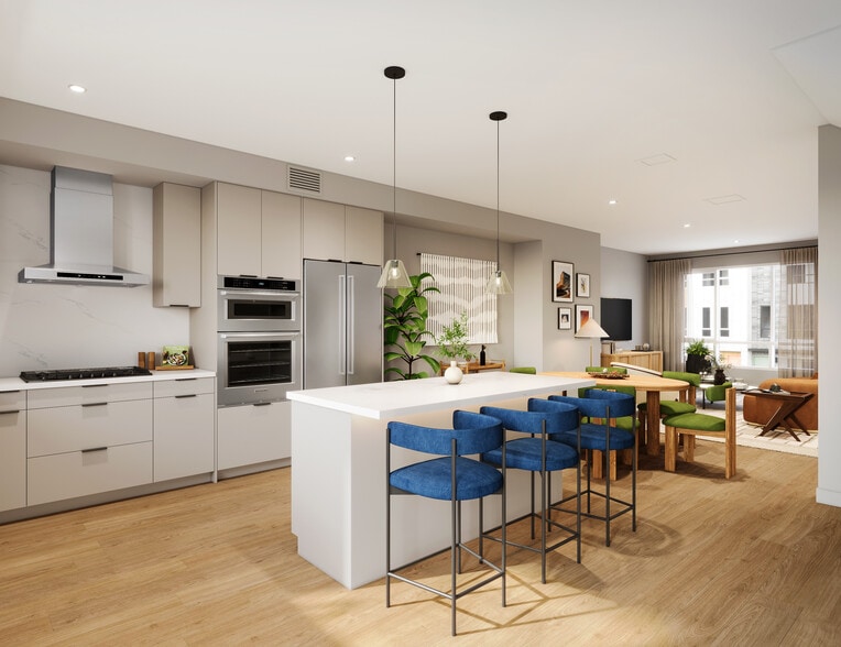 Signature Collection I 4-Bedroom Townhome kitchen with upgraded stainless steel appliances, pendant lighting, and more (Rendering) - Avalon Pleasanton