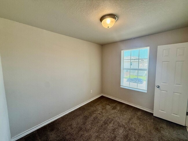 Building Photo - 8331 Breezy Cv