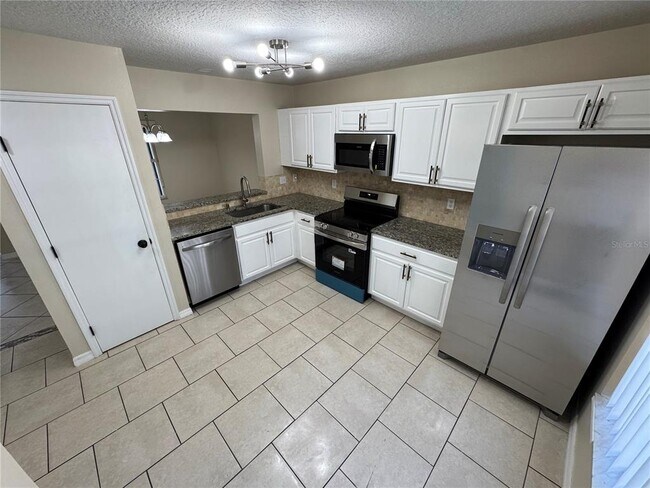 Building Photo - 2251 Cypress Knee Loop