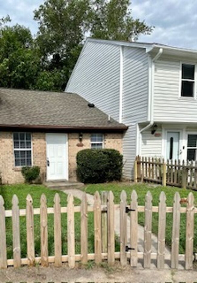 Primary Photo - Single-Level Townhouse with Fenced Backyard