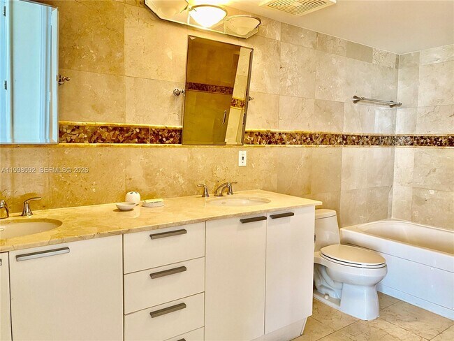 Building Photo - 16699 Collins Ave