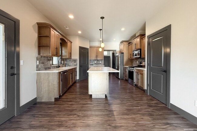 Building Photo - Beautiful 4-Bedroom House with Large Backy...