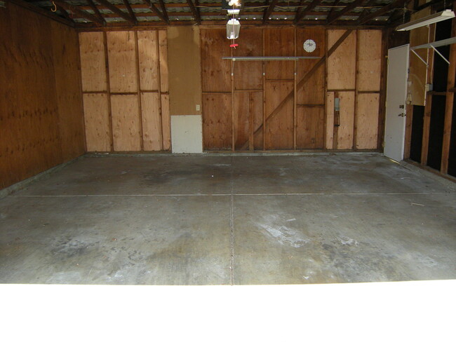 Building Photo - Condo unit featuring updated kitchen with ...