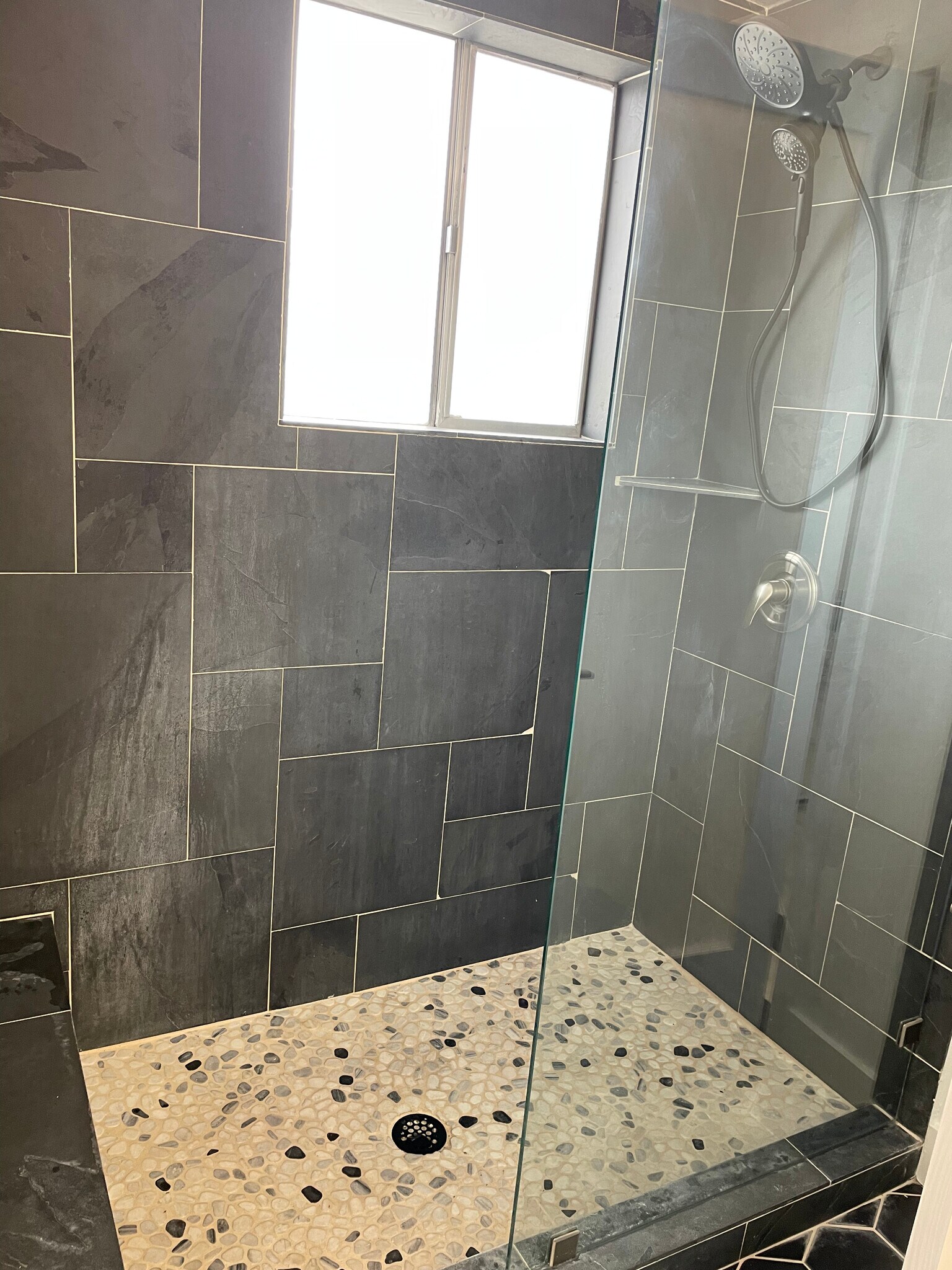 Shower with stone floor - 6125 E Indian School Rd