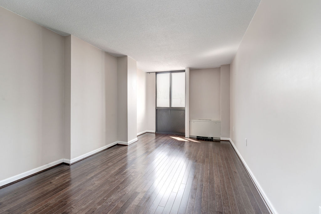 King-sized bedroom with large window! - 4242 East West Hwy