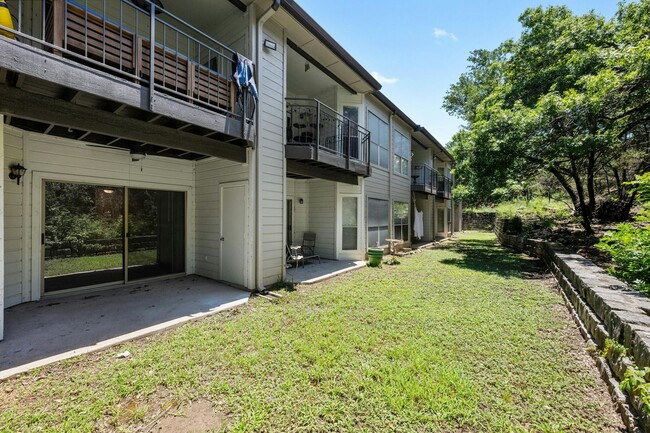 Building Photo - Tranquil Condo with Gorgeous Wooded View A...