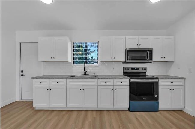 Building Photo - 322 Ixora Ave NW