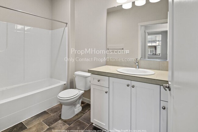 Building Photo - Charming One-Bedroom Condo in the Heart of Bull Mountain - Pool & Gym Access Included!