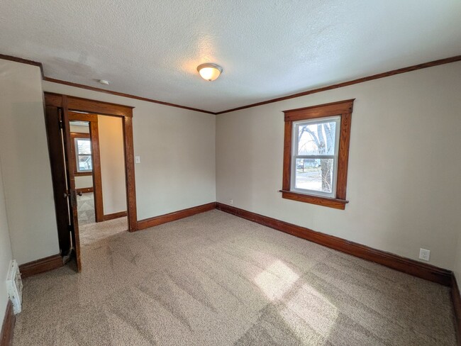 Building Photo - Large 4 Bedroom Home with Garage, Deck, & Fence!