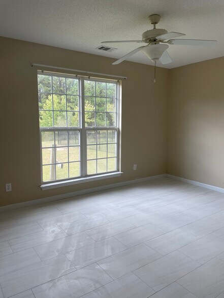 Rear bedroom looking at the pond - 145 White Dogwood Ln