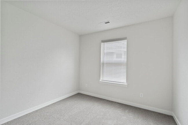 Building Photo - 10419 Rockaway Ridge St