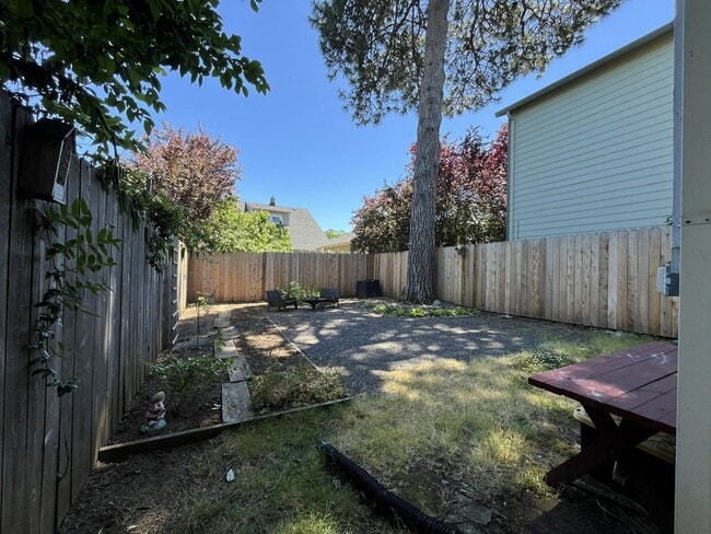Building Photo - Charming Cottage with Hardwood Flooring, Modern Kitchen & Beautiful Outdoor Living Areas