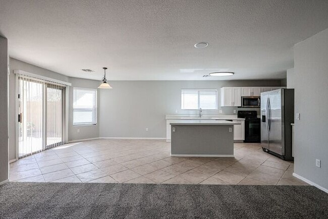 Building Photo - Introducing a stunning 4-bedroom, 2.5-bath...