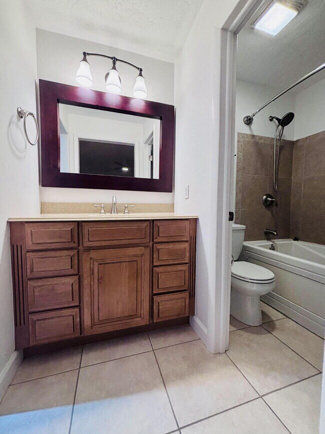 Building Photo - Coastal 4-Bedroom Oasis – Walk to the Beach!