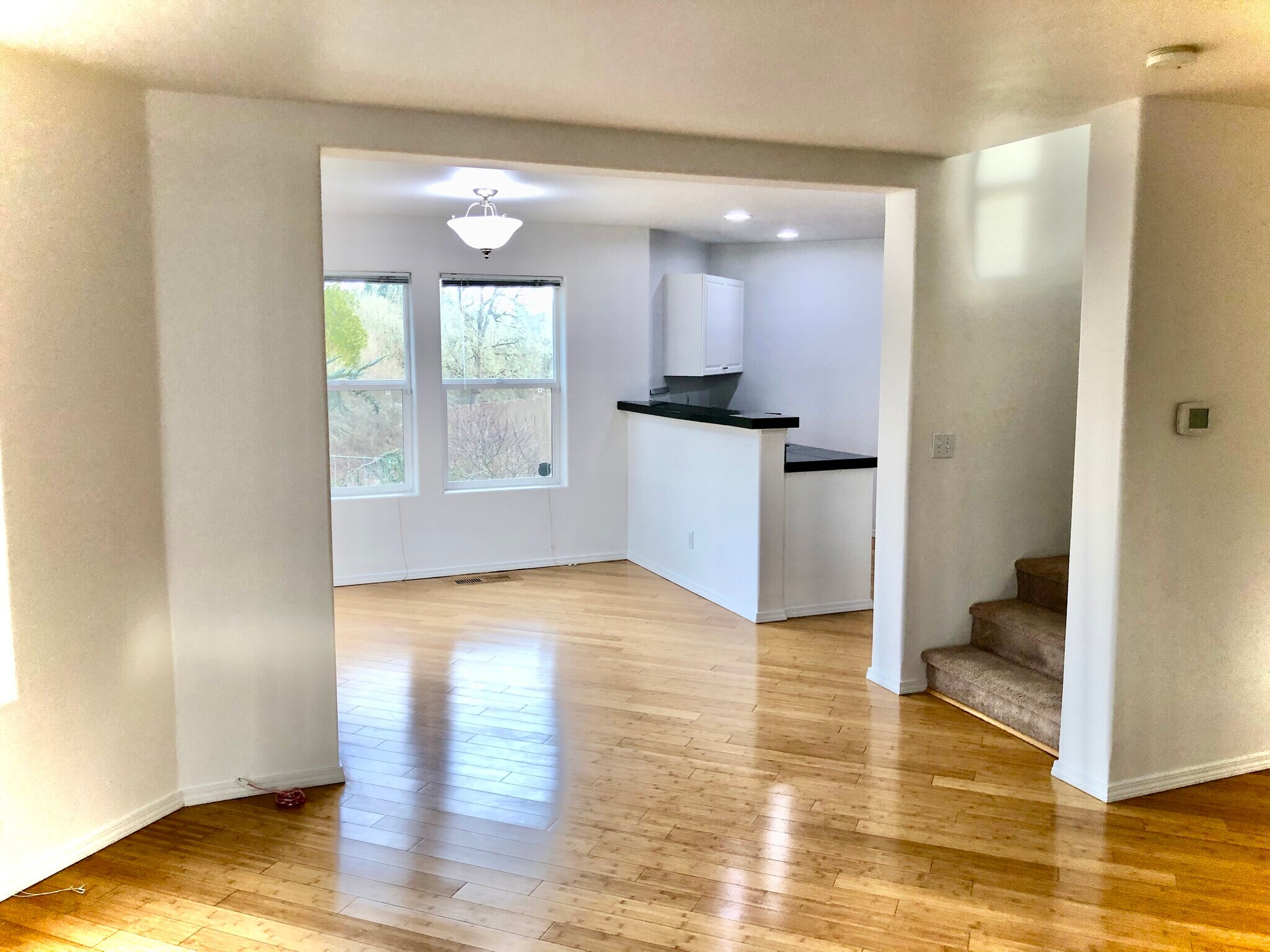 Dining and kitchen - 1552 SE Ripplewood Ave