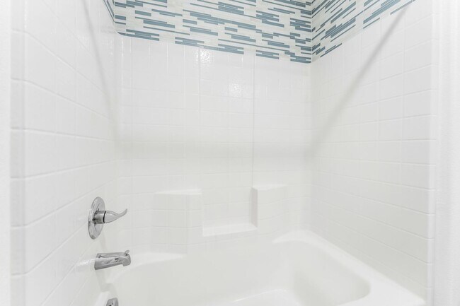 Building Photo - Modern Gated Townhome with Flexible Living Spaces & Stylish Finishes!