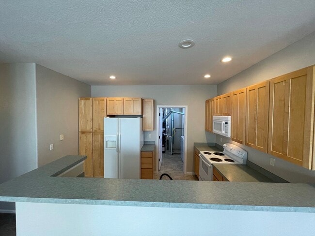 Building Photo - Built to Spoil! Gated Community in Denver with attached Garage!