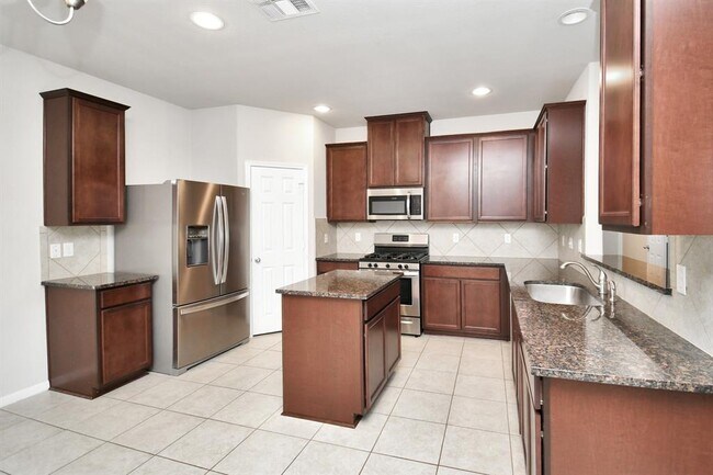 Building Photo - 7230 Victorville Dr
