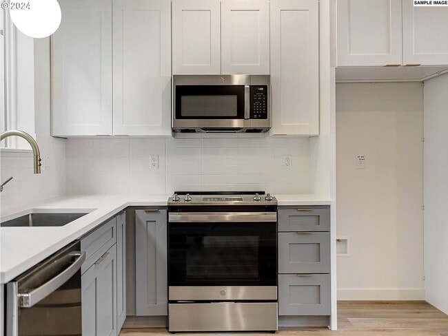 Building Photo - Inviting Home with Open Living & Stainless Steel Kitchen