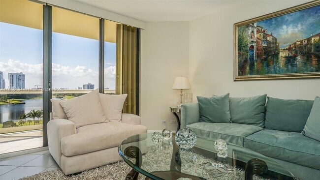 Building Photo - 20191 E Country Club Dr
