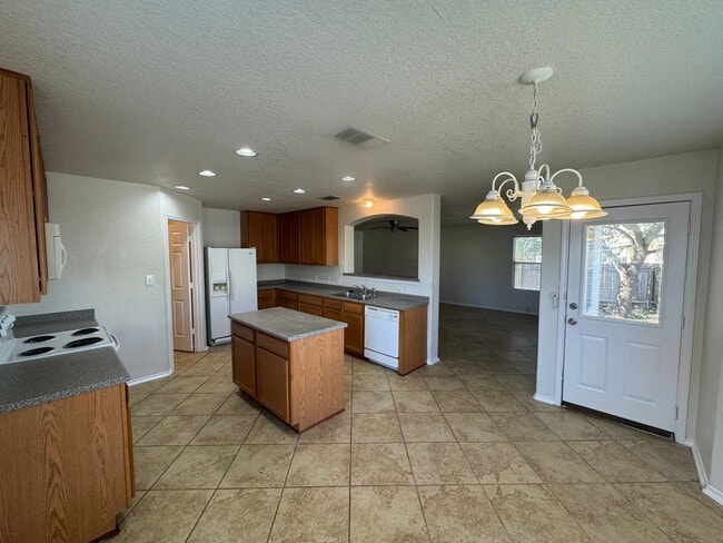 Building Photo - CUTE 2-STORY NESTLED ON A CUL-DE-SAC FEATURING AN ISLAND KITCHEN WITH STOVE/RANGE, DISHWASHER, MI...