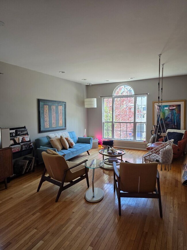 Building Photo - Stunning 3–4 Bedroom Townhome in Private Community | Garage + EV Charger | Deck with Tree Views