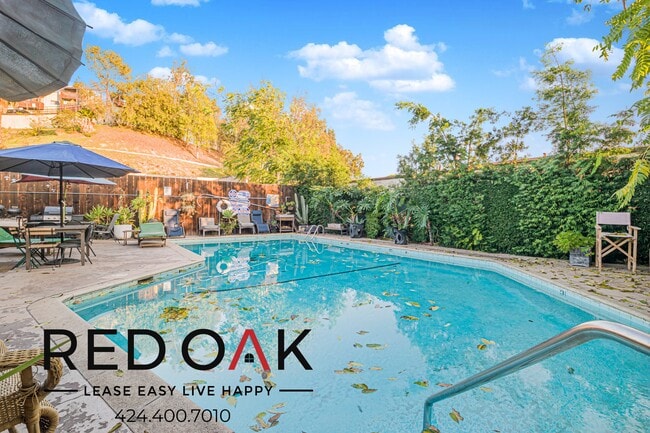 Building Photo - 211 S Ave 57