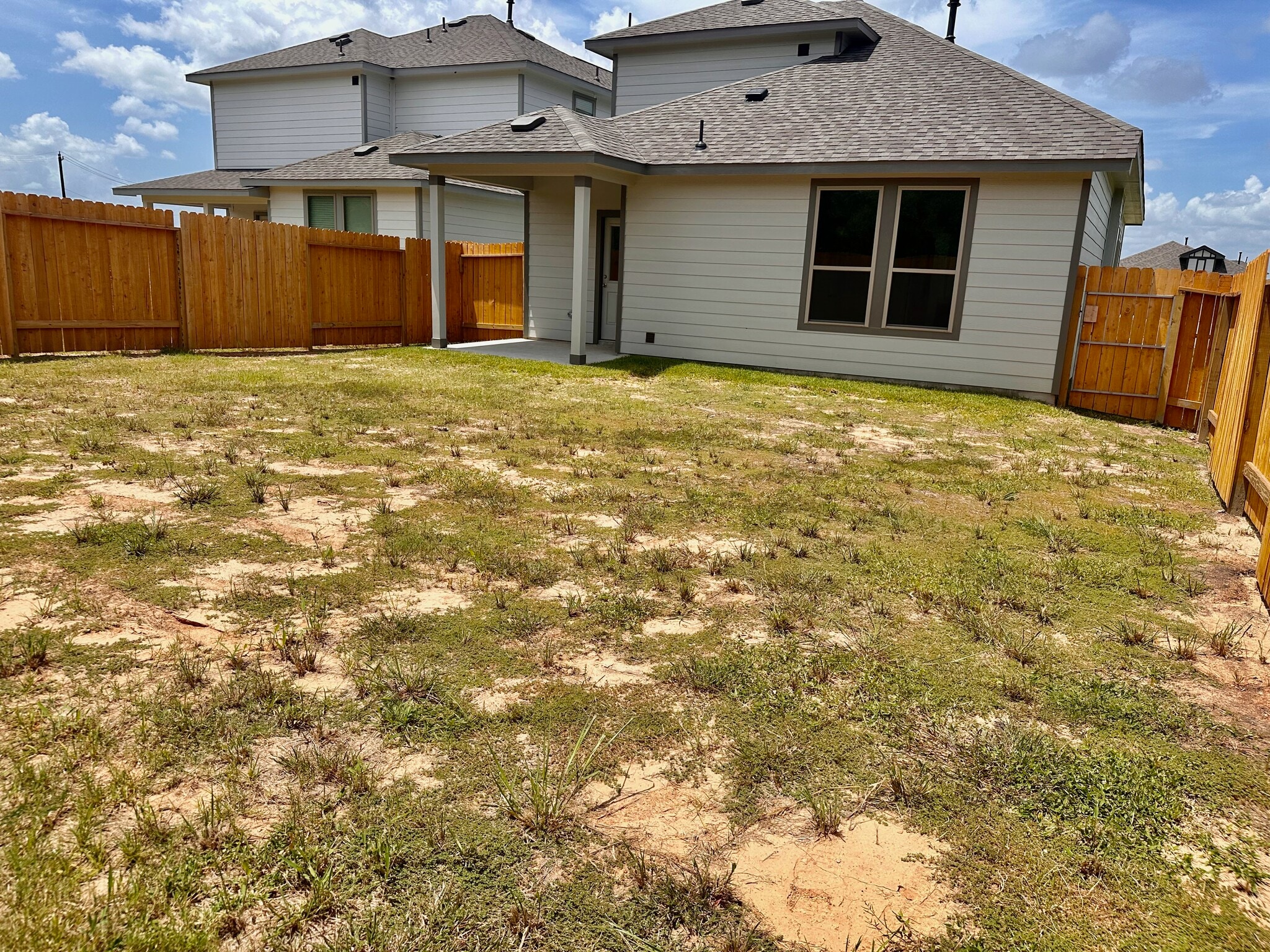 The backyard is equipped with fresh sod and a sprinkler system! - 730 Tejas Village Pky