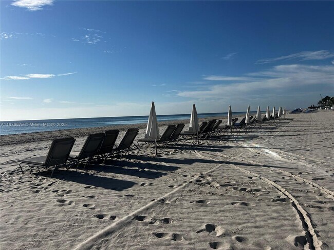 Building Photo - 9801 Collins Ave