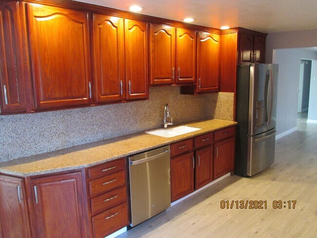 Building Photo - HUGE Bonus room ! Remodeled !  Hardwood Flooring Throughout & New Carpet in Bedrooms, Tile, Grani...