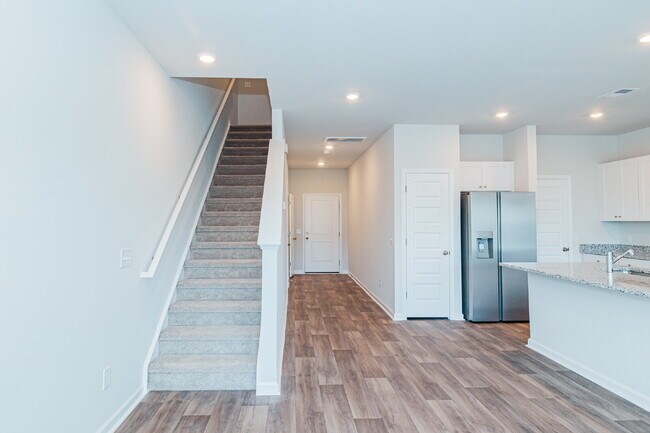 Building Photo - Brand-new 3 bedroom, 2.5 Bath Townhome with pond view