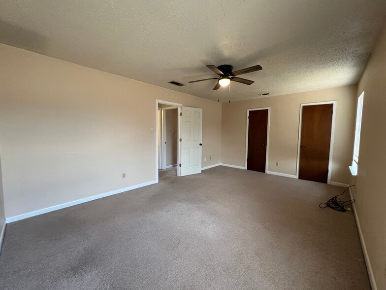 Bedroom 1 view 2, two walk-in closets - 203 Bourbon St