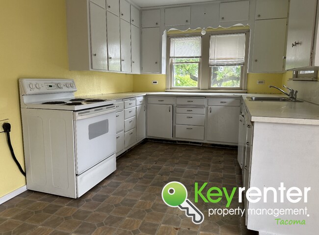 Building Photo - Adorable 4 Bedroom 1.5 Bath Tacoma Home + ...